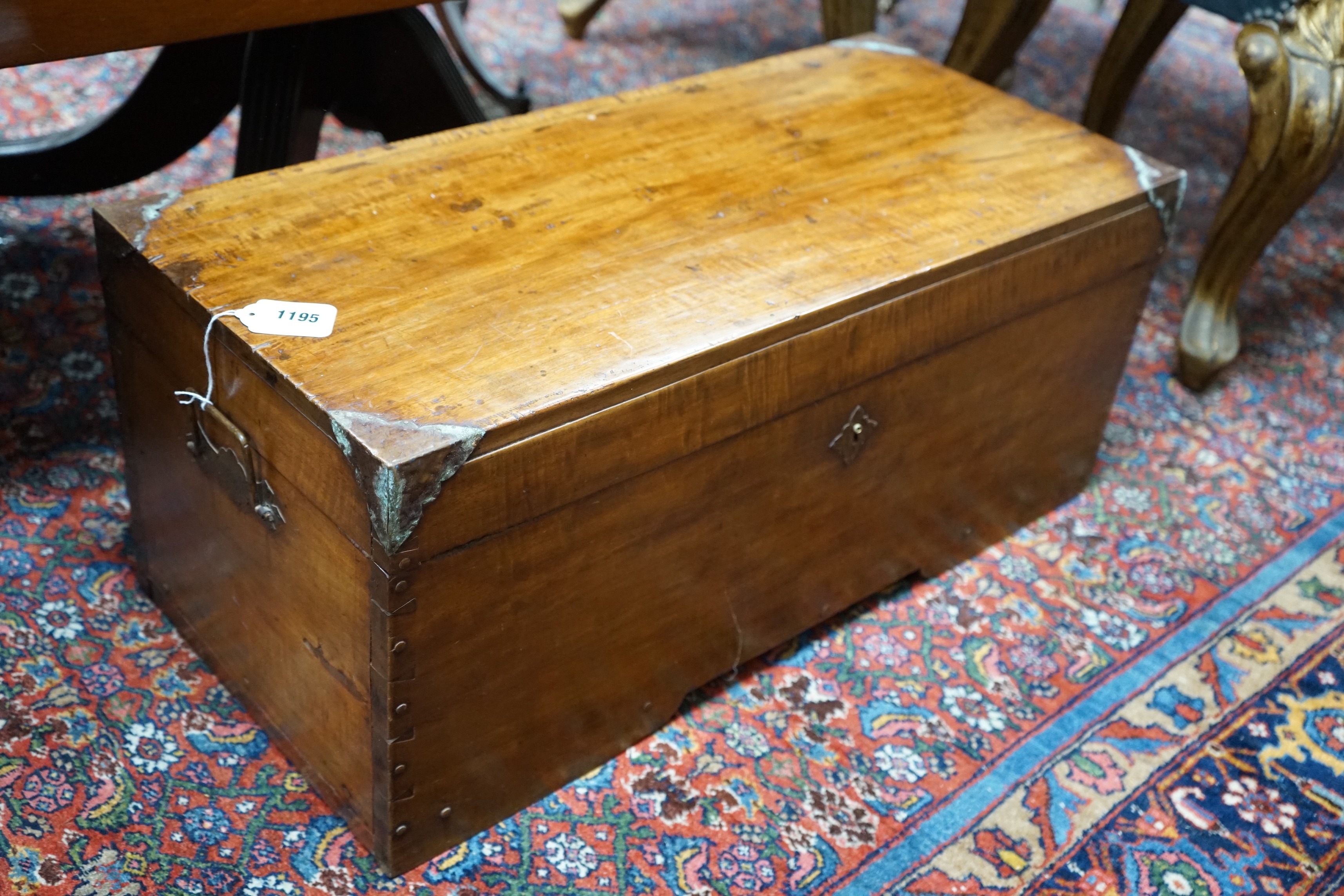 A small brass mounted hardwood trunk, length 75cm, depth 34cm, height 32cm